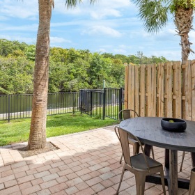 Private patio with water front view and boat slips Private patio with water front view and boat slips for residents at The Isles